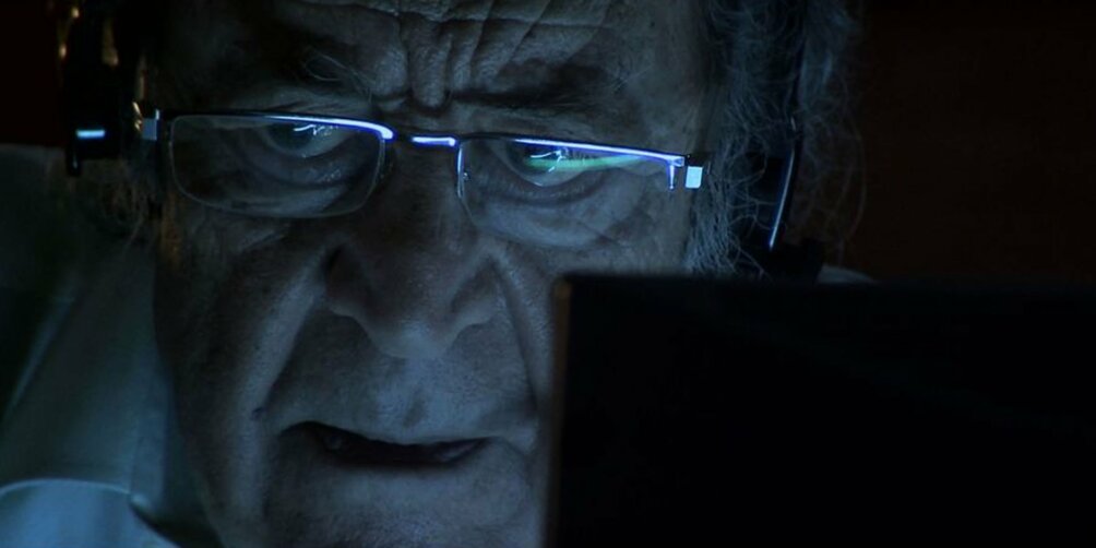 Alexis Sellam checks his computer.