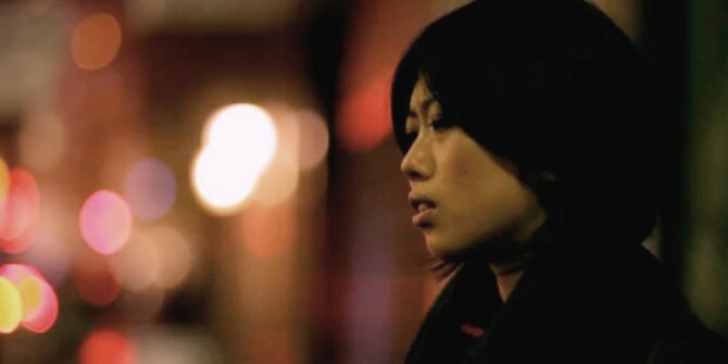 Harue Yamada as Yukiko, lost in Paris at night.